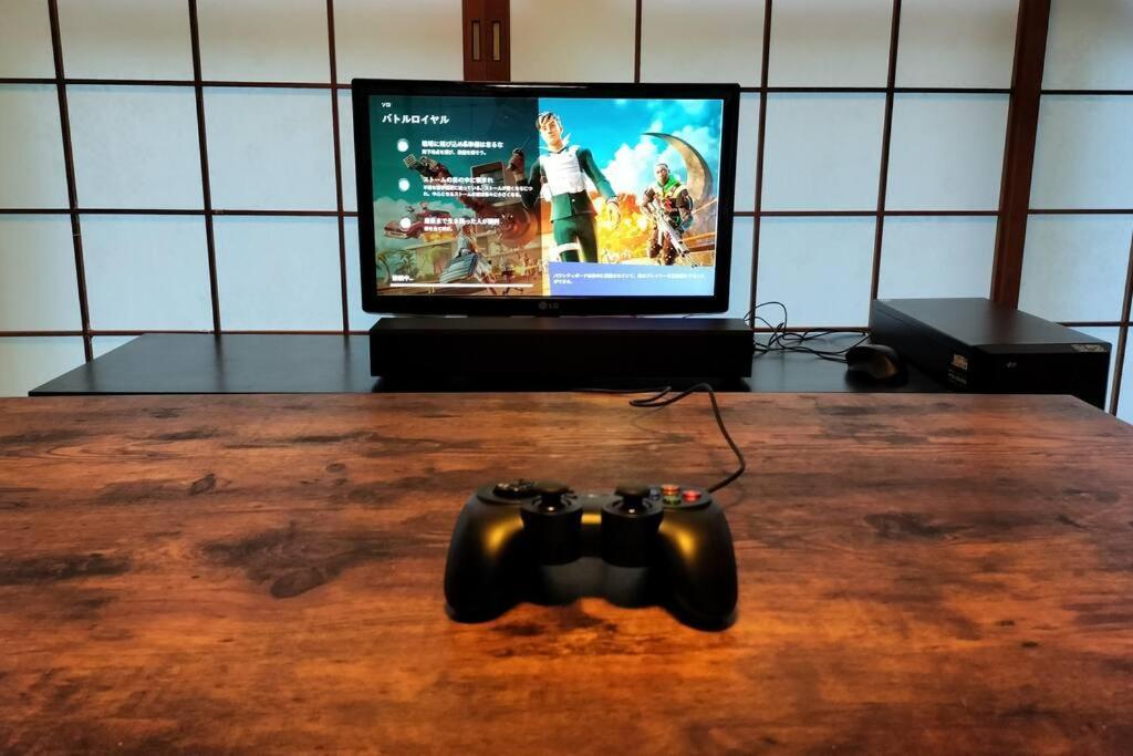 Holiday home 滝が見える半露天x自動麻雀卓x12時チェクイン後すぐにbbq可x最大14名xペット可 Mino